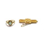 A 15 carat gold bar brooch, length 4.2cm; and an opal cluster ring, finger size N (a.f.). Brooch -