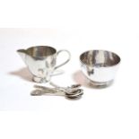 A 20th century planished silver sugar bowl and cream jug, by MESA, London, with six various