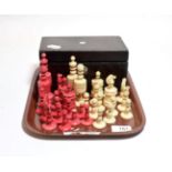 A stained and turned bone Staunton pattern chess set, late 19th century, the king 10cm high,