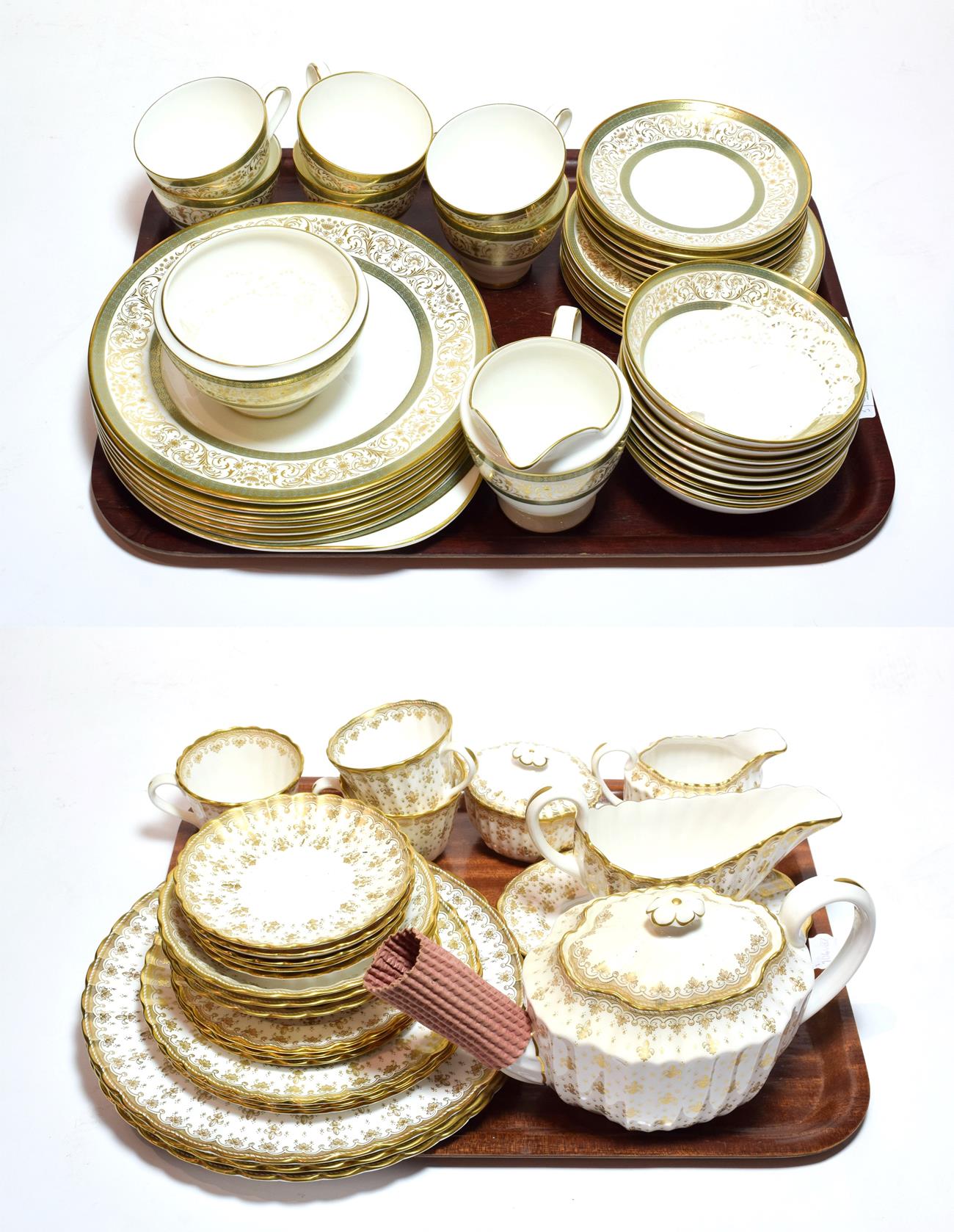 A quantity of Spode and Minton Fleur de Lys Gold and Aragon pattern tea and dinner wares (qty)