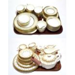 A quantity of Spode and Minton Fleur de Lys Gold and Aragon pattern tea and dinner wares (qty)