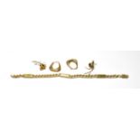 A fancy link bracelet, stamped '750', length 19.8cm; a pair of bow motif earrings, unmarked; and a