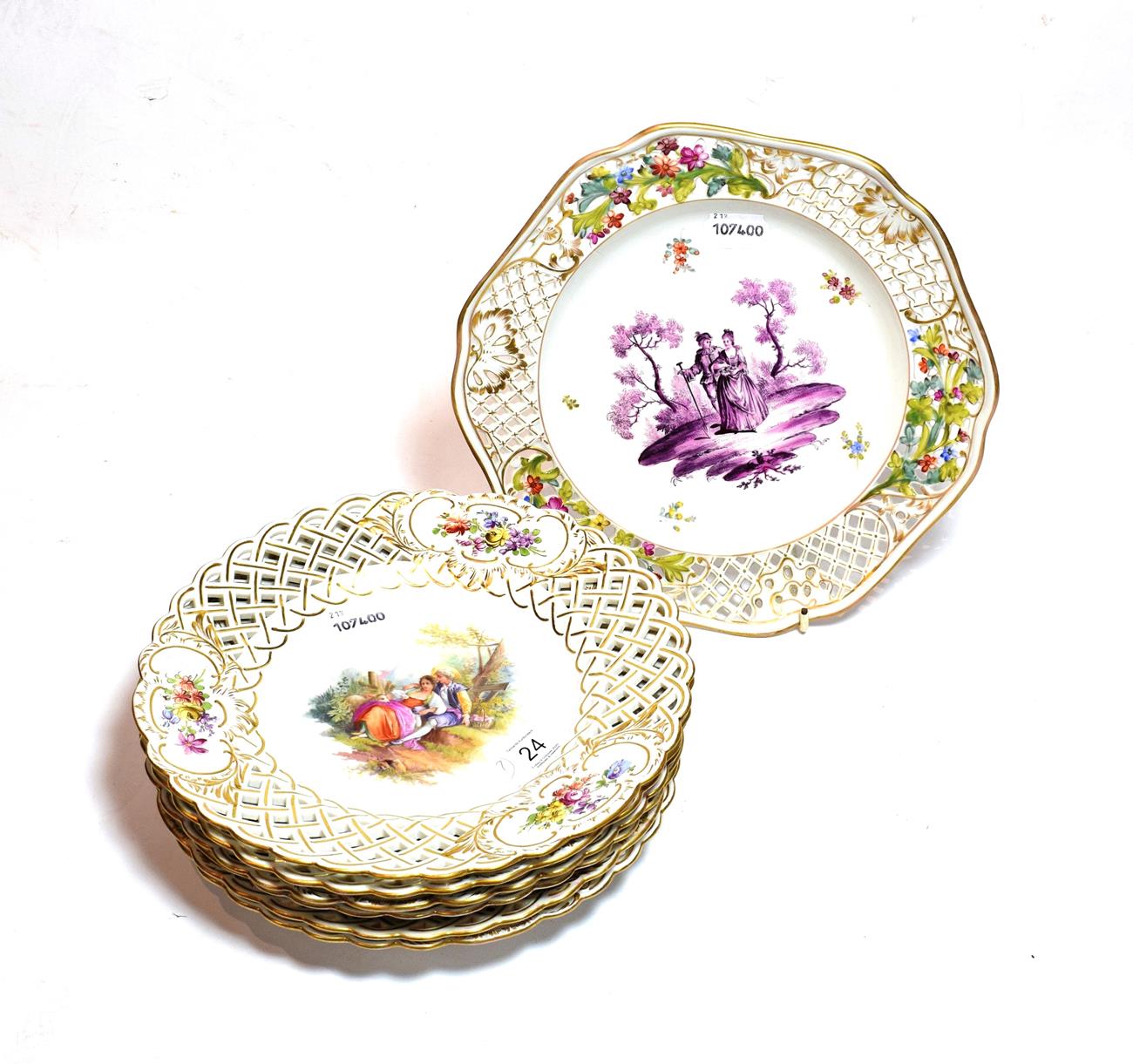 Six 20th century Meissen dessert plates, each with pierced border, floral vignettes and central