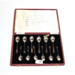 A set of twelve cased silver assay mark tea and coffee spoons