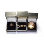 A cameo brooch, stamped '9CT', pin lacking; a 9 carat gold cultured pearl ring, finger size P; a