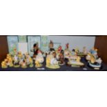 A shelf of Royal Doulton Whinnie the Pooh models and Bunnykins models