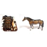 Beswick horses including: Exmoor pony, Horse (head and leg tucked), stocky jogging mare, large