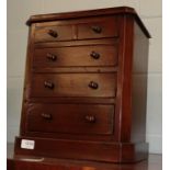A late 19th century mahogany miniature chest of drawers