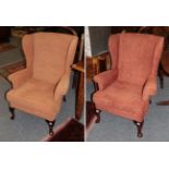 Two mahogany framed wing-back armchairs