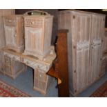 A limed oak five-piece bedroom suite, comprising wardrobe, dressing table, bed and pair of bedside