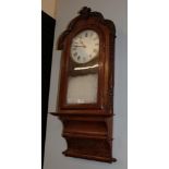 A walnut veneered inlaid drop-dial striking wall clock, circa 1890