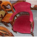 A Victorian mahogany slipper chair; together with two 19th century mahogany carvers; a Victorian