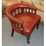 A Victorian mahogany framed studded red leather horseshoe-back chair