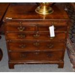 A 19th century mahogany bachelor's chest, with dressing slide above two short over three long