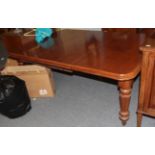 A Victorian mahogany extending dining table with one additional leaf, 184cm (extended) by 128cm by