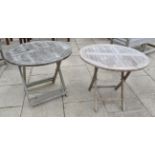 Two circular folding garden tables