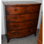 A Victorian mahogany bow-front four-height chest of drawers