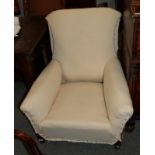 A Howard style armchair (in need of re-upholstering)