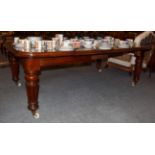 Victorian mahogany wind out dining room table on turned and fluted legs, 74cm high by 204cm by