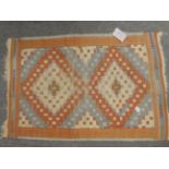 A Kashgai rug, together with a flat weave and a machine made rug (3)