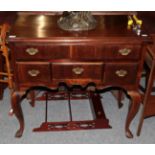 A 20th century mahogany lowboy, 88cm by 45cm by 84cm high