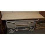 A console table with painted scroll cast wrought iron base and reconstituted marble top, 150cm by