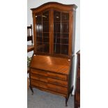 An early 20th century bureau bookcase, 96cm by 46cm by 210cm high