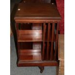 An Edwardian mahogany revolving bookcase