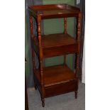 A Victorian mahogany three-tier whatnot, with wooden gallery, the bottom two tiers fitted with