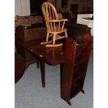 A 19th century mahogany drop-leaf table; a modern open bookcase; and a modern child's rocking chair