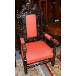 A Victorian carved oak part-upholstered hall chair