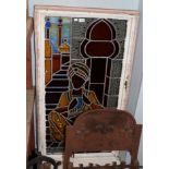 A mid 20th century coloured and leaded glass window depicting a Middle Eastern gentleman