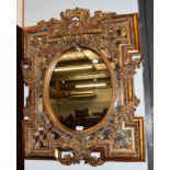 A reproduction gilt framed mirror