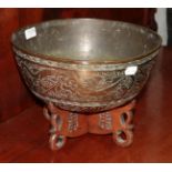 A 20th century brass Chinese punch bowl on stand