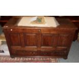 An 18th century panelled oak mule chest