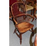 A 19th century yew and elm Windsor chair