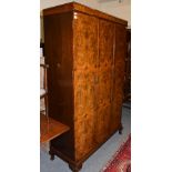 A 1950's walnut wardrobe