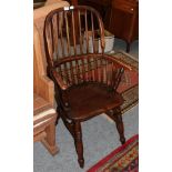 A 19th century elm Windsor chair