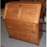 An early 20th century oak bureau