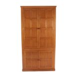 Cat and Mouseman: Lyndon Hammell (Harmby): An English Oak Panelled Linen/Pantry Cupboard, with