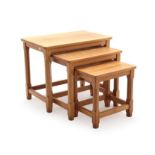 A Carthouse Furniture of Thirsk English Oak Nest of Three Tables, on octagonal legs joined by rails,