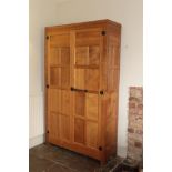 Workshop of Robert Mouseman Thompson (Kilburn): A Bespoke English Oak Panelled Linen Cupboard, penny