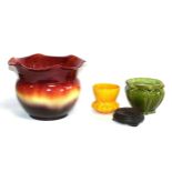 A Bretby Art Pottery Jardinière, shape 1061, red, yellow and purple glaze, impressed factory