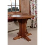 Workshop of Robert Mouseman Thompson (Kilburn): A 2ft 6'' English Oak Circular Dining Table, on a