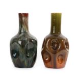 Two Linthorpe Pottery Dimpled Bottle Vases, shape 24, in mustard and green glaze and green and