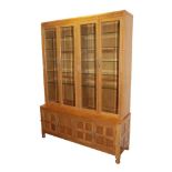 Workshop of Robert Mouseman Thompson (Kilburn): An English Oak Display Storage Cupboard, 2000, penny