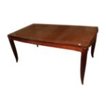 A French Art Deco 6ft Rosewood Dining Table, the shaped rectangular top on four splayed legs,