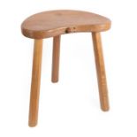 Workshop of Robert Mouseman Thompson (Kilburn): An English Oak Cow Stool, post 1970, the kidney