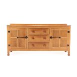 Squirrelman: Wilfrid Hutchinson (Husthwaite): An English Oak Panelled Sideboard, with raised