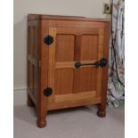 Workshop of Robert Mouseman Thompson (Kilburn): An English Oak Panelled Bedside Cupboard, with